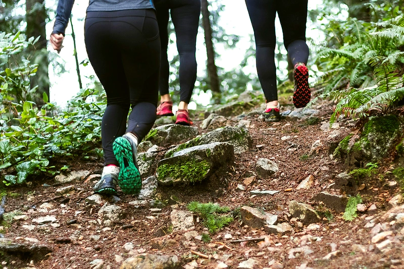 Runner on a forest trail, cross-country race.