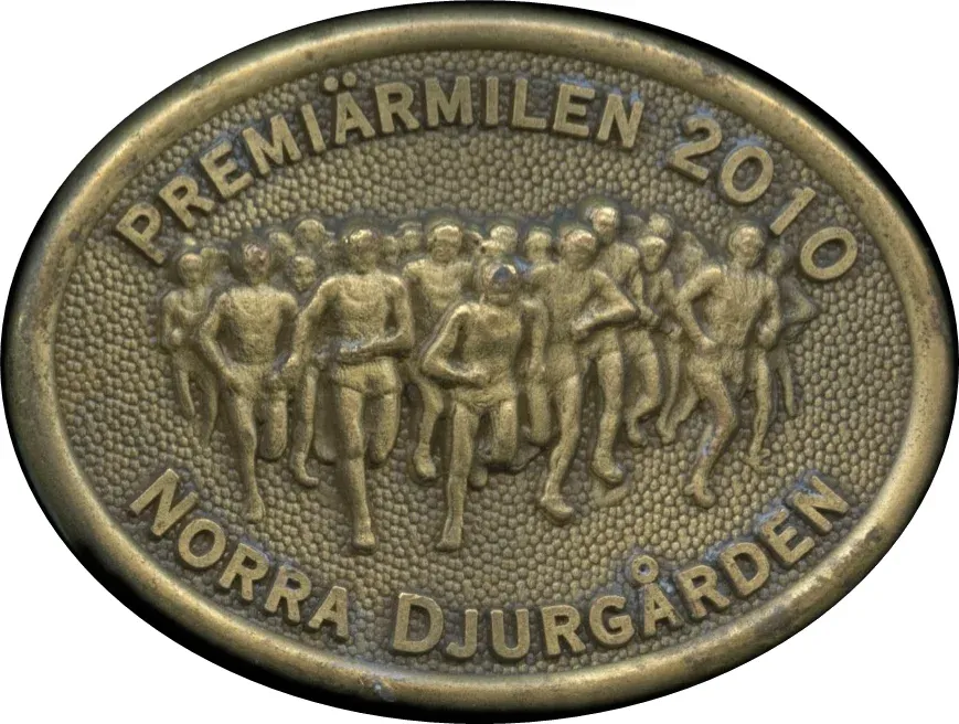 Premiärmilen 2010 medalj med löpare.